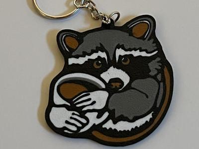 Raccoon Holding Coffee Cup Keychain