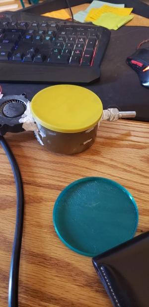 Salmon or tuna can snap on lid.