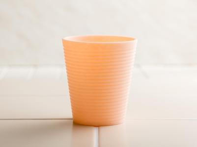 Cup with horizontal stripes.