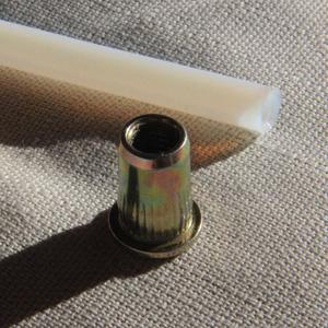 Bowden clamp with a blind rivet nut (not printed)