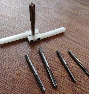 Universal mini tap tool