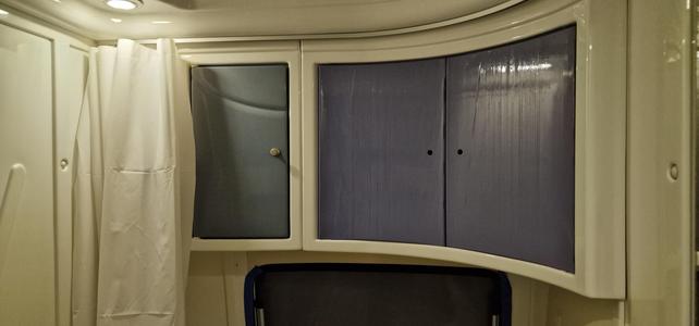 Camper van closet door