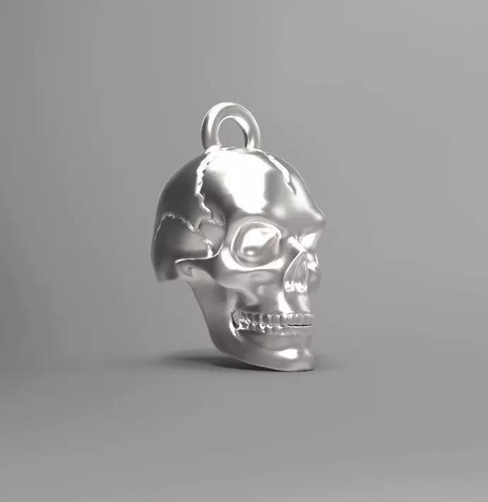 Human skull pendant