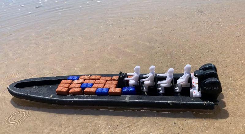 model of narcolancha drug traffickers 3.75 with articulated figures and yamaha 300 outboard engine