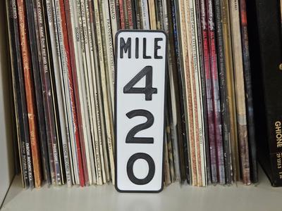 Mile 420 road sign
