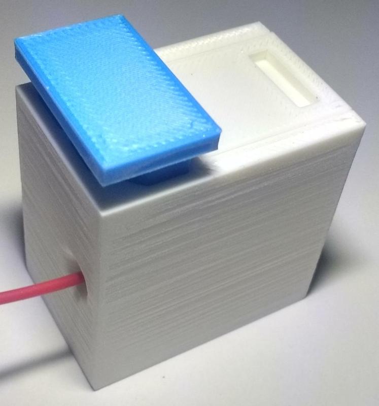 Filament cutter with compartment