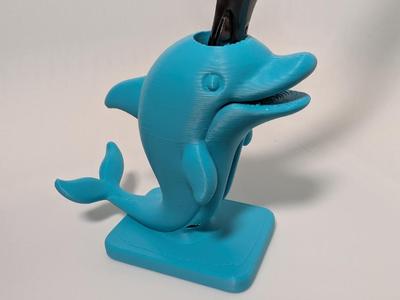 Dolphin toothbrush holder