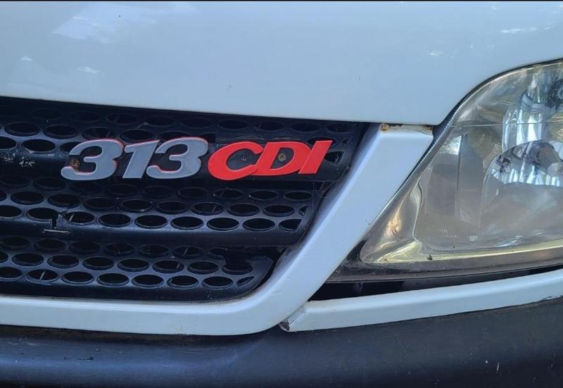 313 cdi Front logo
