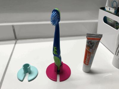 Baby toothbrush holder