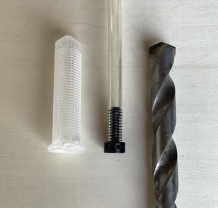 Cleaning nozzle for a hose to clean deep bores
