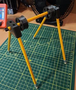 Filament spool holder with pencils and printed bearings