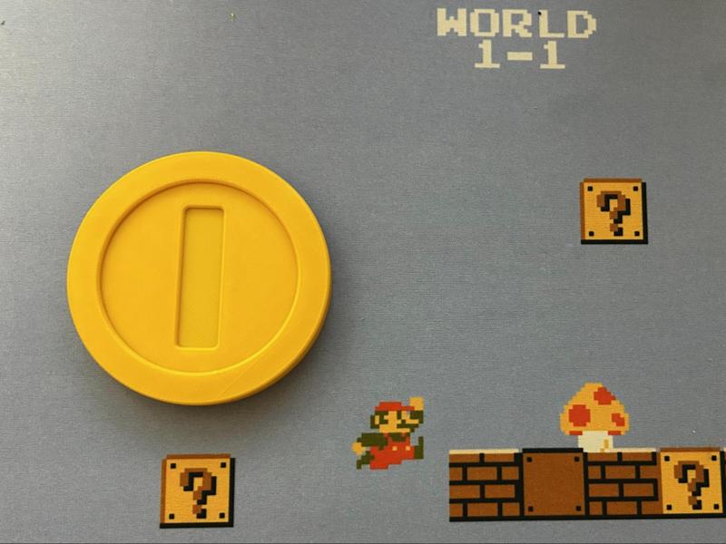 Two-sided Super Mario coin