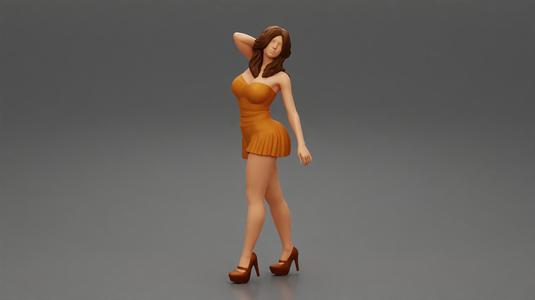 fashion girl walking with hand in hair in mini dress