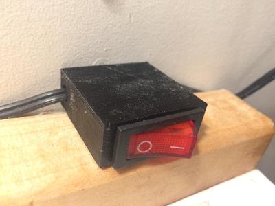 Rocker switch enclosure