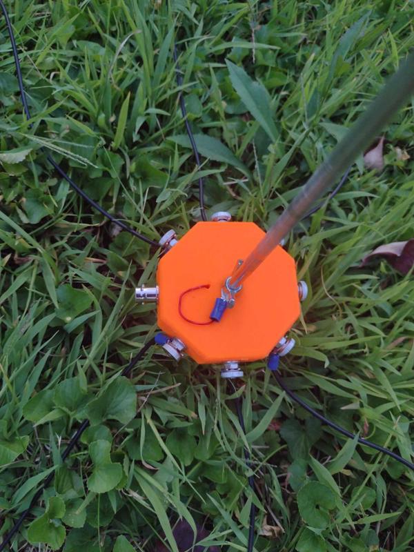 Pack style center loaded vertical HF antenna