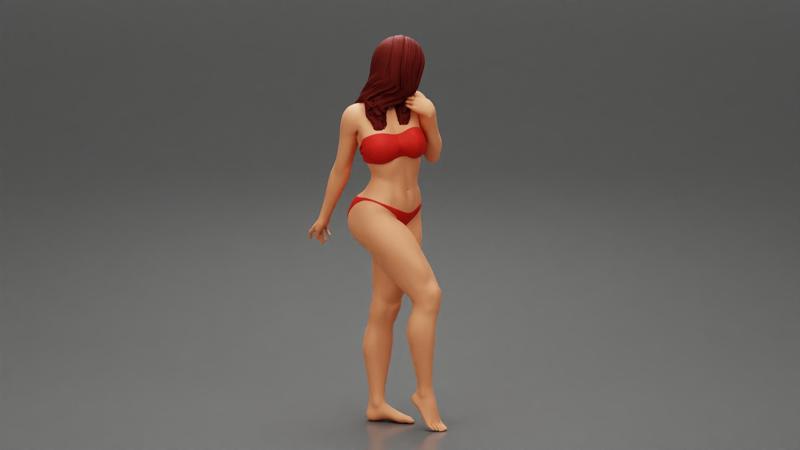 Beautiful Woman In Bikini Posing On Beach