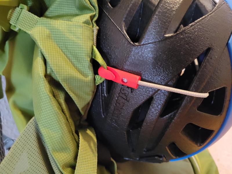 Backpack helmet holder hook