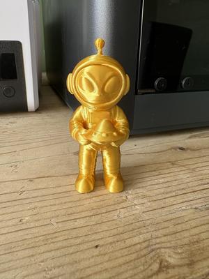 Alien Holding UFO Toy