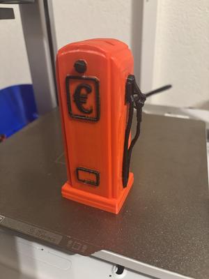 Petrol pump money box
