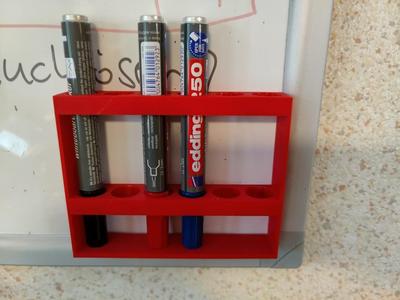 Magnetic bracket for whiteboard marker