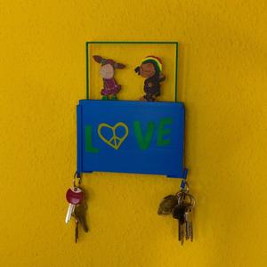 Key holder with moving characters