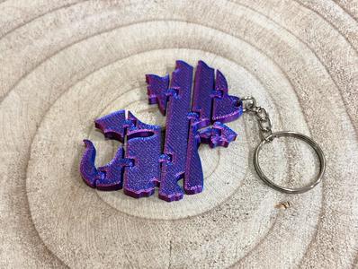Articulated baby dragon keychain