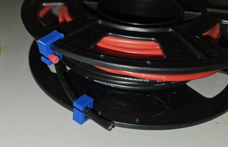 Cable reel wire clip for 3.6mm diameter wire.