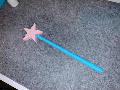 Magic wand with changeable star colours