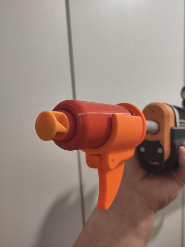 Trigger-style ejector for wildstyle pistol