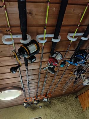 Fishing rod cealing holder