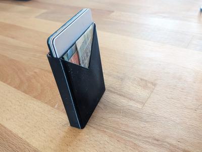 Single piece slim wallet for TPU