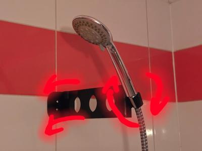 Shower head holder with hinge and shower angle