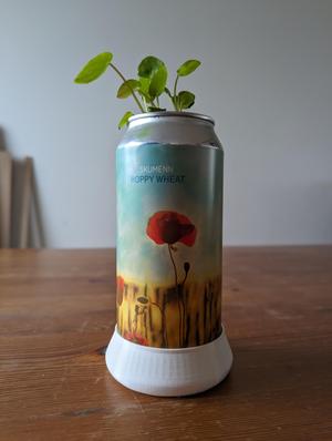 Watering tray for beer can planter.