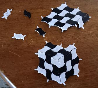 Curved two-sided lozenge tiles