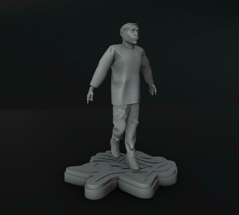 Tupac Spitting Statue