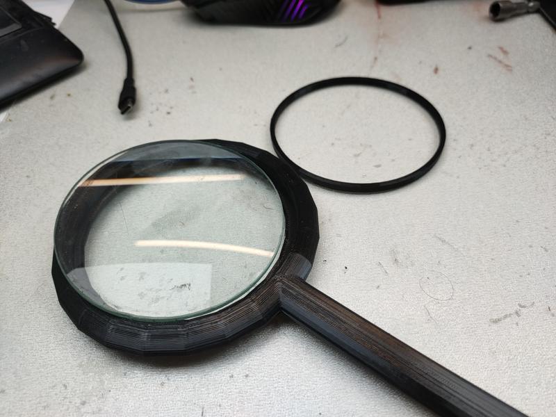 magnifying glass holder