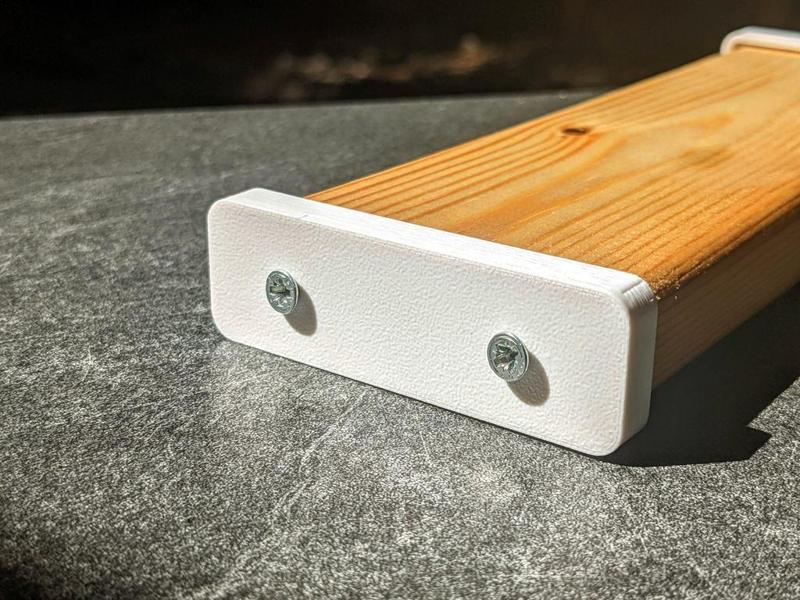 End cap for wood slat