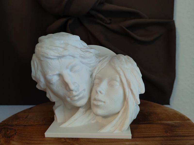 Two Faces Sculptures with Wall-Mounted