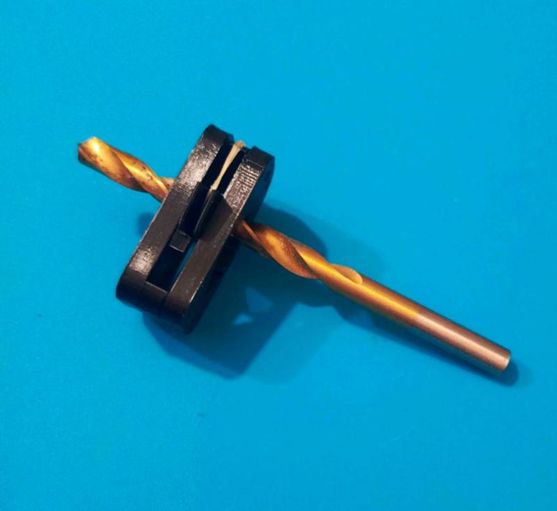 Self-clamping drill depth gauge
