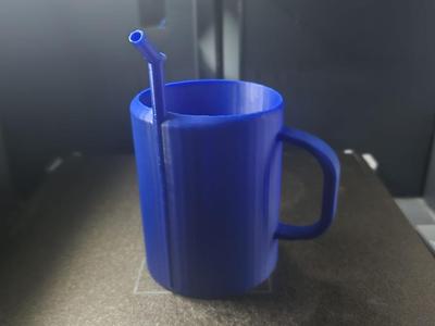 Cup with straw