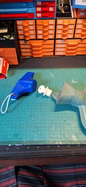Hot water bag opener aid
