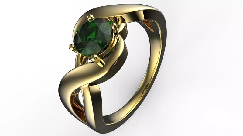 SOLITARIO gold ring with emerald stone