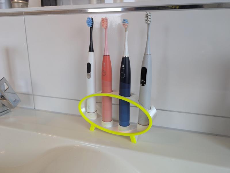Oclean 4-piece toothbrush holder family.