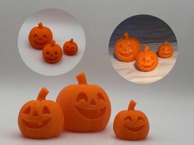 Jack-o’-Lantern Family – trio of smiling pumpkins