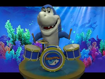 JabberJaw shark holding drum
