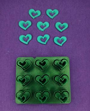 Miniature cutter of openwork hearts