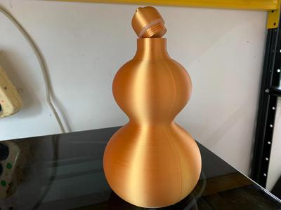 Water gourd with a screw-on lid