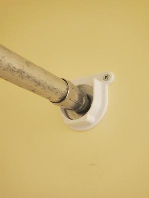 Shower curtain rod bracket