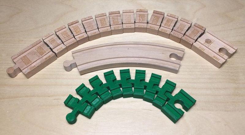 Parametric segmented track compatible with standard wooden train track