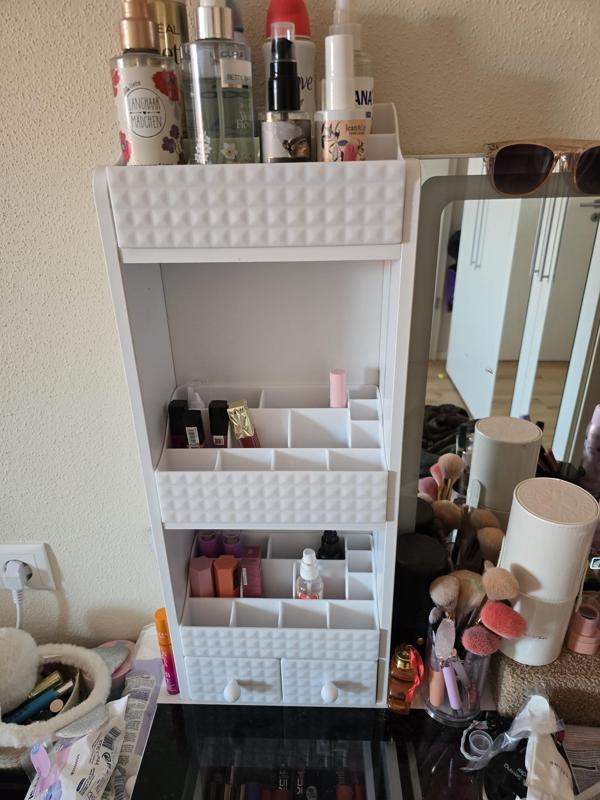 Cosmetics organizer built into a shelf